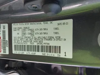 2021 Toyota Tacoma SR z VIN 5TFCZ5AN1MX274315, wystawiony jako IAAI lot #42273054 z przebiegiem 67 863 mil mil oraz . Historia ofert i sprzedaży dostępna na DreamBid. Obrazek 9.