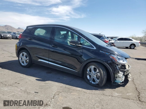 2018 Chevrolet Bolt EV LT with VIN 1G1FW6S0XJ4110517, listed as a Copart auction lot 52772995 with 56,492 mi miles and Salvage title. Bid and sale history available at DreamBid. Image 4.