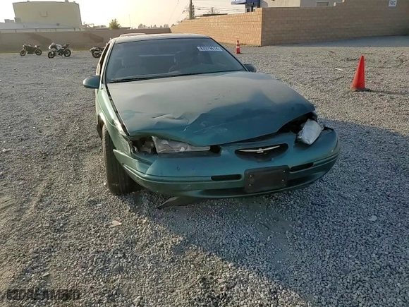 1997 Ford Thunderbird LX with VIN 1FALP62W4VH170423, listed as a Copart auction lot 83379614 with 93,117 mi miles and Salvage Title. Bid and sale history available at carsss.com. Image 10.