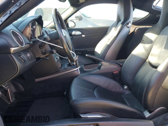 2006 Porsche Cayman S с VIN WP0AB29866U782423, выставлен на аукционе Copart как лот 87725325 с пробегом 51 686 миль миль и Списание • Salvage title. История ставок и продаж доступна на DreamBid. Изображение 7.