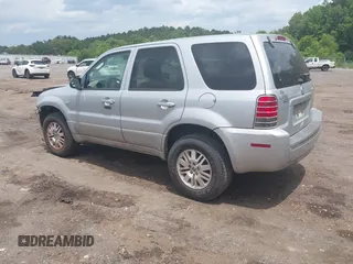 2005 Mercury Mariner Luxury z VIN 4M2YU56155DJ18530, wystawiony jako IAAI lot #42307355 z przebiegiem 74 905 mil mil oraz . Historia ofert i sprzedaży dostępna na DreamBid. Obrazek 3.