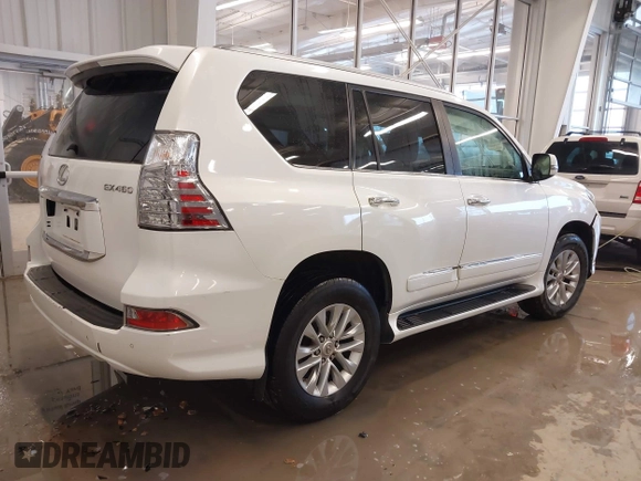 2015 Lexus GX with VIN JTJBM7FX8F5106280, listed as a IAAI auction lot 41590906 with 158,163 mi miles and . Bid and sale history available at carsss.com. Image 4.