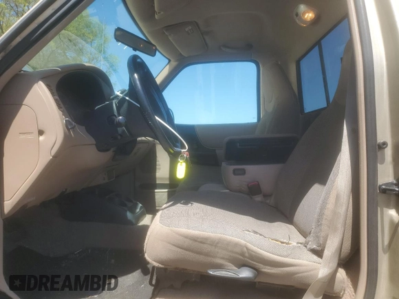 2000 Ford Ranger XL with VIN 1FTYR10V7YTA43903, listed as a Copart auction lot 54822975 with 177,187 mi miles and Salvage Title. Bid and sale history available at DreamBid. Image 7.