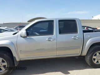 2010 GMC Canyon SLE1 z VIN 1GTJSCDEXA8130361, wystawiony jako IAAI lot #41734671 z przebiegiem 52 621 mil mil oraz . Historia ofert i sprzedaży dostępna na DreamBid. Obrazek 14.