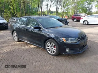 2013 Volkswagen Jetta GLI Autobahn with VIN 3VW467AJ2DM215802, listed as a IAAI auction lot 42077962 with 102,339 mi miles and . Bid and sale history available at DreamBid. Image 1.
