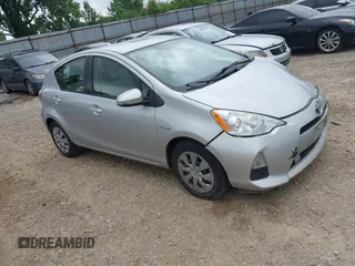 2014 Toyota Prius One z VIN JTDKDTB36E1075986, wystawiony jako IAAI lot #42460824 z przebiegiem 209 327 mil mil oraz . Historia ofert i sprzedaży dostępna na DreamBid. Obrazek 1.