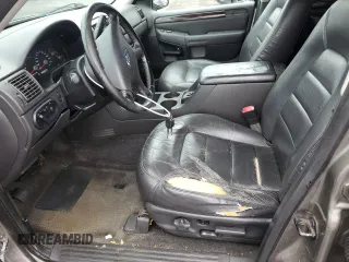 2003 Ford Explorer Limited with VIN 1FMZU75K93UB14585, listed as a Copart auction lot 56888695 with 260,077 mi miles and Salvage title. Bid and sale history available at DreamBid. Image 7.