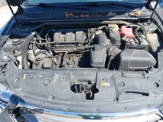 2014 Ford Taurus SEL with VIN 1FAHP2E82EG162676, listed as a IAAI auction lot 41795220 with 125,491 mi miles. Bid and sale history available at carsss.com. Image 10.