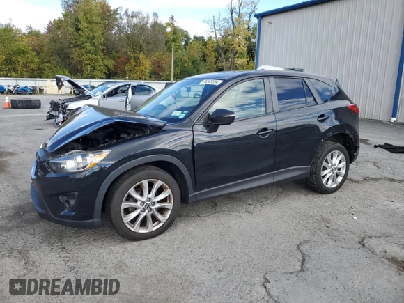 2015 Mazda CX-5 Grand Touring with VIN JM3KE4DY2F0480639, listed as a Copart auction lot 75248594 with 104,652 mi miles and Non Repairable. Bid and sale history available at carsss.com. Image 1.