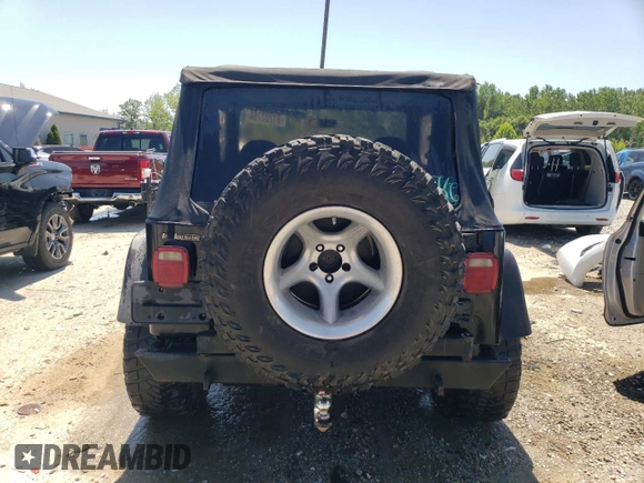 1997 Jeep Wrangler SE with VIN 1J4FY29P2VP431639, listed as a Copart auction lot 61222754 with 225,081 mi miles and Salvage Title. Bid and sale history available at carsss.com. Image 6.