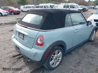 2013 MINI Cooper Convertible with VIN WMWZN3C53DT135427, listed as a IAAI auction lot 41954817 with 57,029 mi miles. Bid and sale history available at carsss.com. Image 4.
