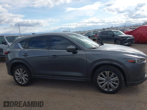 2023 Mazda CX-5 Signature with VIN JM3KFBXY9P0102087, listed as a IAAI auction lot 41771949 with 35,610 mi miles and . Bid and sale history available at carsss.com. Image 13.