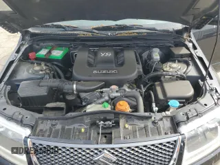 2007 Suzuki Grand Vitara with VIN JS3TE941474202110, listed as a Copart auction lot 52110865 with 132,661 mi miles and Salvage title. Bid and sale history available at DreamBid. Image 12.