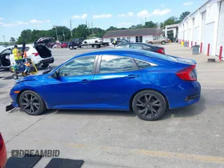 2019 Honda Civic Sport with VIN 2HGFC2F86KH525252, listed as a IAAI auction lot 41998144 with 79,417 mi miles and . Bid and sale history available at DreamBid. Image 14.