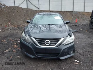 2018 Nissan Altima SV with VIN 1N4AL3AP3JC205875, listed as a IAAI auction lot 41892855 with 159,630 mi miles and . Bid and sale history available at DreamBid. Image 13.