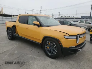 2022 Rivian R1T Launch Edition z VIN 7FCTGAAL2NN011755, wystawiony jako Copart lot #59934185 z przebiegiem 12 261 mil mil oraz Szkoda całkowita • Salvage title. Historia ofert i sprzedaży dostępna na DreamBid. Obrazek 4.