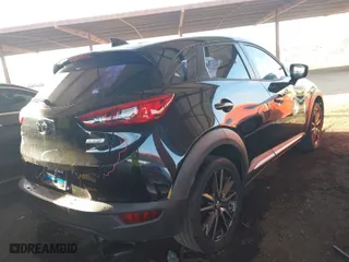 2016 Mazda CX-3 Grand Touring with VIN JM1DKBD75G0104797, listed as a IAAI auction lot 41511240 with 105,383 mi miles. Bid and sale history available at carsss.com. Image 4.