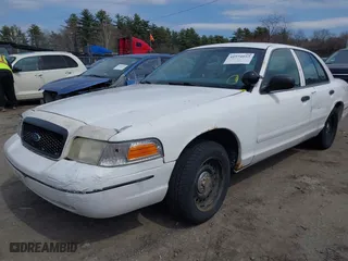 2000 Ford Crown Victoria Police Pkg Police Interceptor with VIN 2FAFP71W6YX169248, listed as a IAAI auction lot 41974053 with 230,658 mi miles. Bid and sale history available at carsss.com. Image 17.