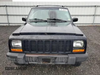 1999 Jeep Cherokee Sport with VIN 1J4FF68S8XL671341, listed as a Copart auction lot 58136475 with 139,848 mi miles and Salvage title. Bid and sale history available at DreamBid. Image 5.