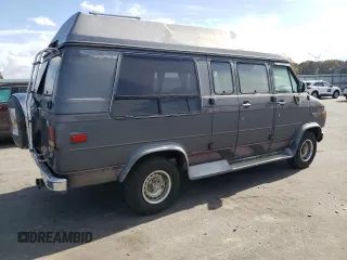 1994 Chevrolet Chevy Van z VIN 1GBEG25K5RF123489, wystawiony jako Copart lot #79491854 z przebiegiem 82 970 mil mil oraz Szkoda całkowita • Salvage title. Historia ofert i sprzedaży dostępna na DreamBid. Obrazek 3.
