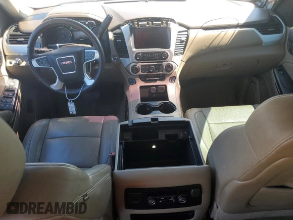 2016 GMC Yukon SLT with VIN 1GKS1BKCXGR439435, listed as a Copart auction lot 61202804 with 168,196 mi miles and Salvage Title. Bid and sale history available at carsss.com. Image 8.