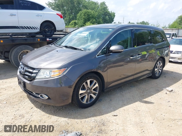 2014 Honda Odyssey Touring with VIN 5FNRL5H99EB138952, listed as a IAAI auction lot 42538833 with 146,959 mi miles and . Bid and sale history available at DreamBid. Image 17.