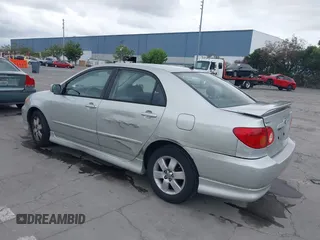 2003 Toyota Corolla CE with VIN 1NXBR32E43Z009933, listed as a IAAI auction lot 42064980 with 153,432 mi miles and . Bid and sale history available at DreamBid. Image 3.