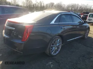 2013 Cadillac XTS Platinum z VIN 2G61V5S3XD9100843, wystawiony jako Copart lot #42943555 z przebiegiem 122 153 mil mil oraz Szkody całkowita. Historia ofert i sprzedaży dostępna na DreamBid. Obrazek 3.