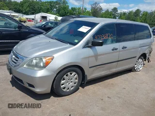 2008 Honda Odyssey LX with VIN 5FNRL38228B090366, listed as a IAAI auction lot 42336820 with 319,401 mi miles and . Bid and sale history available at DreamBid. Image 2.