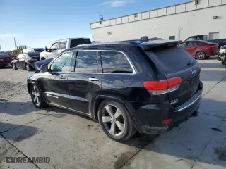 2014 Jeep Grand Cherokee Overland with VIN 1C4RJFCM5EC417335, listed as a Copart auction lot 87300714 with 0 mi miles and Salvage Title. Bid and sale history available at carsss.com. Image 2.