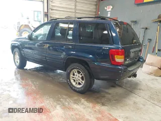 2000 Jeep Grand Cherokee Limited with VIN 1J4GW58N1YC264567, listed as a IAAI auction lot 42215459 with 170,874 mi miles and . Bid and sale history available at DreamBid. Image 3.