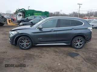 2017 BMW X1 xDrive28i with VIN WBXHT3C35H5F74213, listed as a IAAI auction lot 41589180 with 58,990 mi miles. Bid and sale history available at carsss.com. Image 13.
