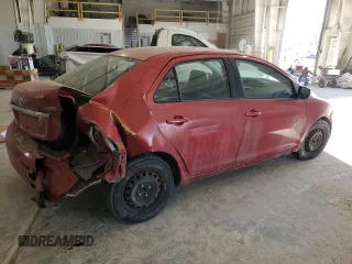 2009 Toyota Yaris with VIN JTDBT903891313898, listed as a Copart auction lot 87820085 with 212,806 mi miles and Salvage Title. Bid and sale history available at carsss.com. Image 3.