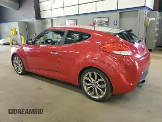 2015 Hyundai Veloster z VIN KMHTC6AD4FU222904, wystawiony jako Copart lot #60853105 z przebiegiem 133 289 mil mil oraz Czysty tytuł • Clean title. Historia ofert i sprzedaży dostępna na DreamBid. Obrazek 2.