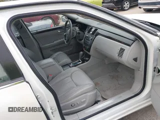 2008 Cadillac DTS 1SA z VIN 1G6KD57Y28U167974, wystawiony jako IAAI lot #40034885 z przebiegiem 116 010 mil mil oraz . Historia ofert i sprzedaży dostępna na DreamBid. Obrazek 5.