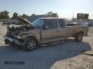 2002 Ford F-150 XL with VIN 1FTRX17L22NA48307, listed as a Copart auction lot 74238074 with 80,010 mi miles and Salvage title. Bid and sale history available at DreamBid. Image 1.
