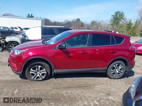 2018 Toyota RAV4 LE with VIN JTMBFREV2JD228186, listed as a IAAI auction lot 42076730 with 93,899 mi miles. Bid and sale history available at carsss.com. Image 14.