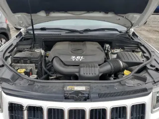 2014 Jeep Grand Cherokee Limited z VIN 1C4RJFBG0EC102776, wystawiony jako Copart lot #58961025 z przebiegiem 187 356 mil mil oraz Czysty tytuł • Clean title. Historia ofert i sprzedaży dostępna na DreamBid. Obrazek 12.