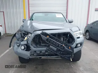 2021 Toyota Tacoma SR z VIN 5TFCZ5AN5MX281428, wystawiony jako IAAI lot #41893437 z przebiegiem 36 204 mil mil oraz . Historia ofert i sprzedaży dostępna na DreamBid. Obrazek 12.