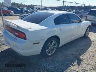 2013 Dodge Charger RT with VIN 2C3CDXDT1DH503587, listed as a IAAI auction lot 41354849 with 122,824 mi miles. Bid and sale history available at carsss.com. Image 4.