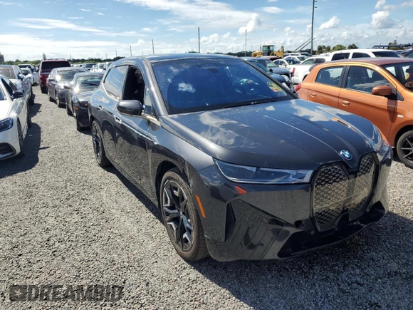 2024 BMW iX M60 z VIN WB533CF00RCN01751, wystawiony jako Copart lot #74145244 z przebiegiem 21 347 mil mil oraz Szkoda całkowita • Salvage title. Historia ofert i sprzedaży dostępna na DreamBid. Obrazek 4.