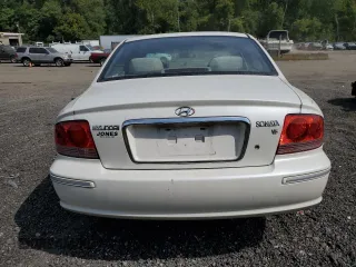 2004 Hyundai Sonata GLS with VIN KMHWF35H94A956887, listed as a Copart auction lot 71002324 with 117,914 mi miles and Salvage Title. Bid and sale history available at carsss.com. Image 6.