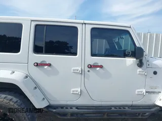 2012 Jeep Wrangler Unlimited Sahara with VIN 1C4BJWEG1CL186407, listed as a IAAI auction lot 42593848 with 178,354 mi miles and . Bid and sale history available at DreamBid. Image 13.