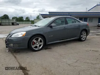 2009 Pontiac G6 GXP 1SA with VIN 1G2ZM577294217264, listed as a Copart auction lot 63824735 with 165,948 mi miles and Salvage title. Bid and sale history available at DreamBid. Image 1.