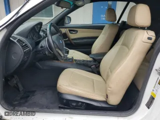 2011 BMW 1 Series 128i with VIN WBAUN1C5XBVH82605, listed as a Copart auction lot 73457334 with 94,969 mi miles and Salvage Title. Bid and sale history available at carsss.com. Image 7.