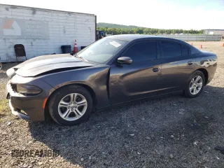 2020 Dodge Charger SXT with VIN 2C3CDXBG1LH103467, listed as a Copart auction lot 56795975 with 108,097 mi miles and Salvage title. Bid and sale history available at DreamBid. Image 1.