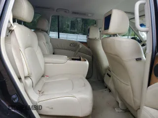 2011 Infiniti QX56 7-passenger with VIN JN8AZ2NE9B9006134, listed as a Copart auction lot 69789604 with 135,786 mi miles and Salvage Title. Bid and sale history available at carsss.com. Image 11.