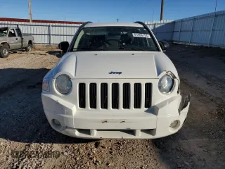 2010 Jeep Compass Sport with VIN 1J4NF4FB7AD503727, listed as a Copart auction lot 81966154 with 134,696 mi miles and Clean Title. Bid and sale history available at carsss.com. Image 5.