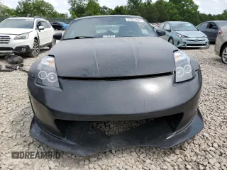 2003 Nissan 350Z Touring z VIN JN1AZ34E43T006603, wystawiony jako Copart lot #57073495 z przebiegiem 236 676 mil mil oraz Szkoda całkowita • Salvage title. Historia ofert i sprzedaży dostępna na DreamBid. Obrazek 5.