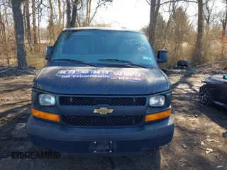 2015 Chevrolet Express Cargo Van with VIN 1GCWGFCF7F1281970, listed as a IAAI auction lot 41898214 with 145,078 mi miles. Bid and sale history available at carsss.com. Image 12.